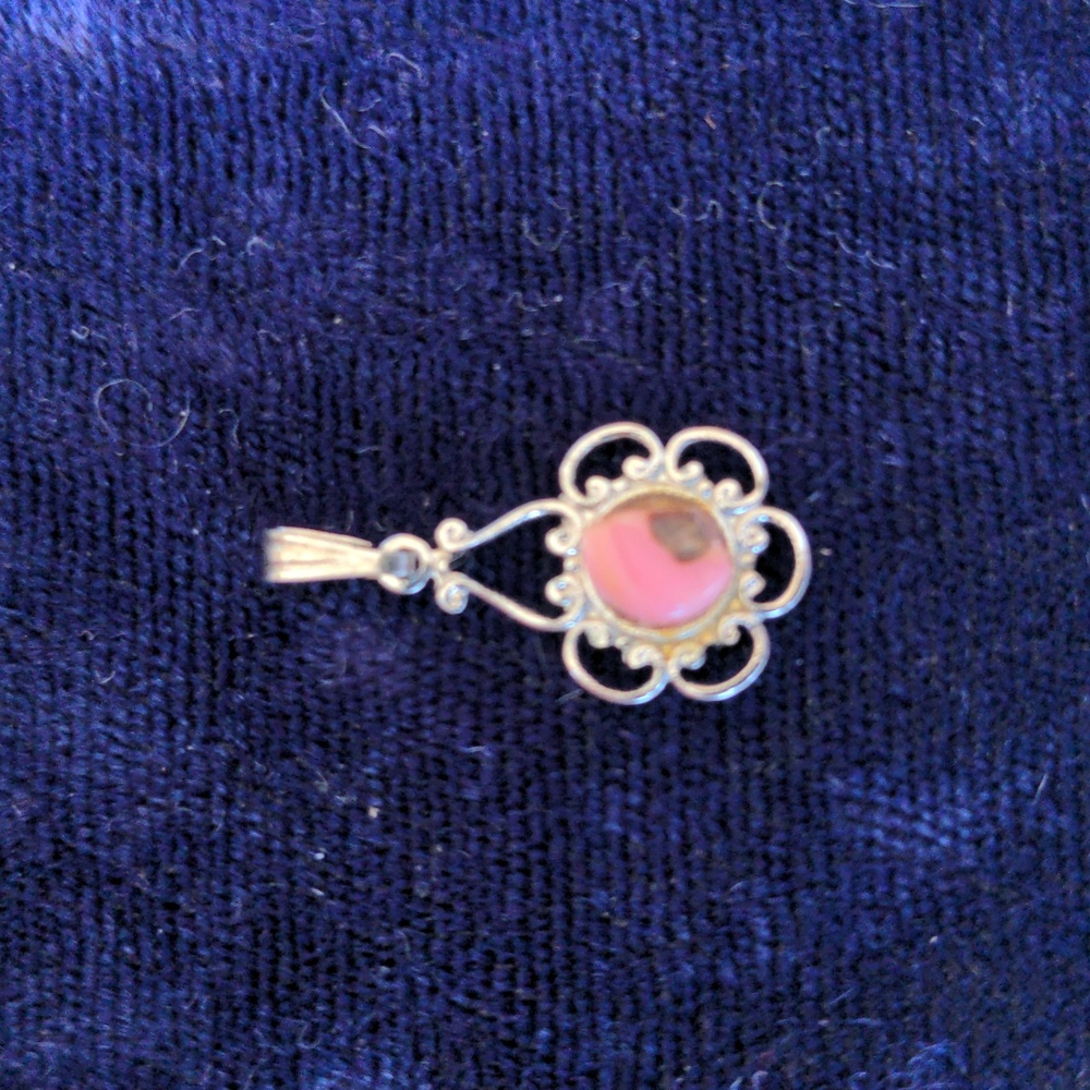 Vintage silver tone delicate flower shaped pendant with natural pink stone